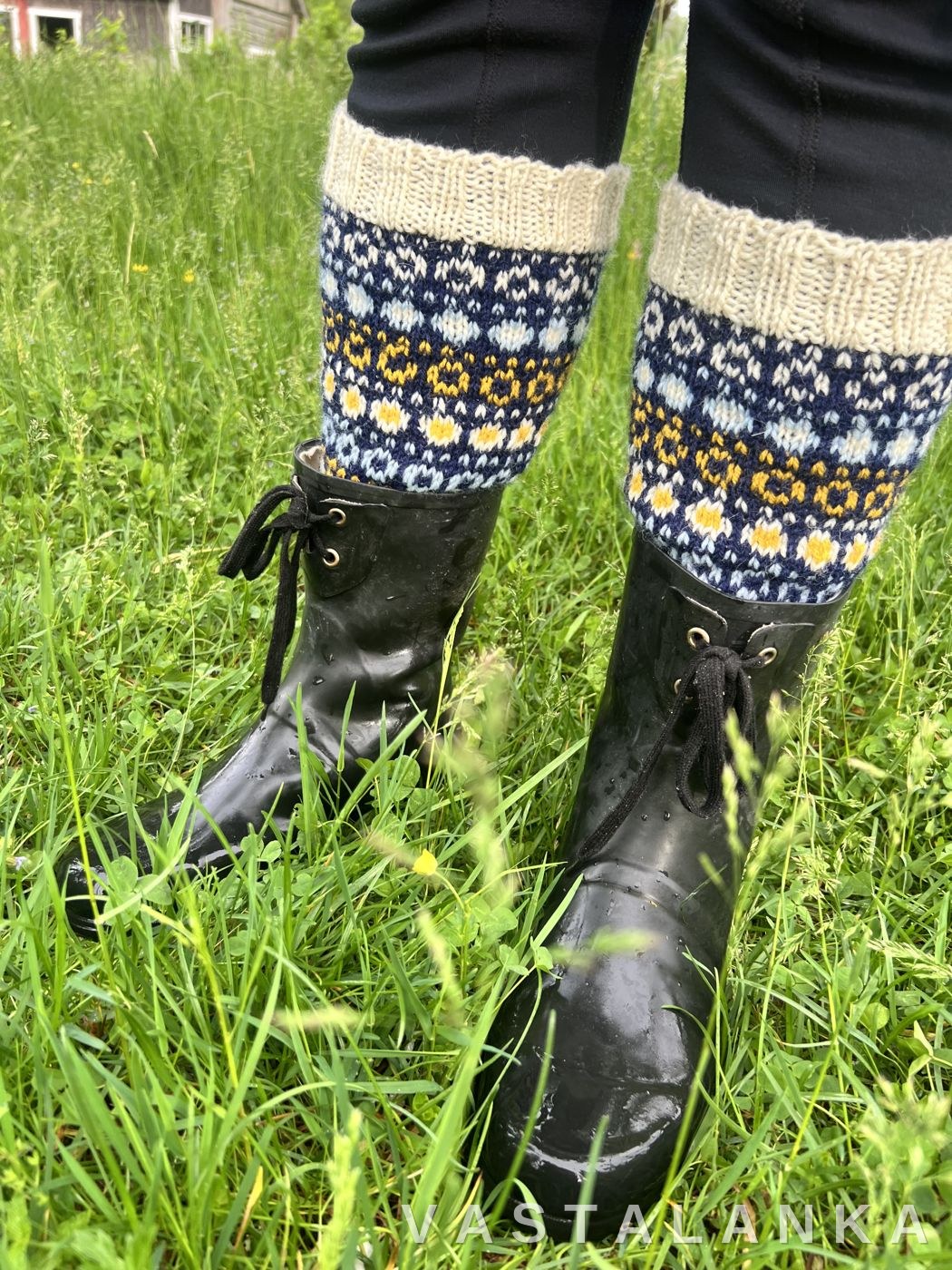 Pallukka socks worn over leggings with wellington boots in summer grass